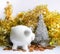 Piggy bank with coins. White ceramic moneybox