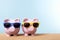 Piggy bank couple vacation saving, holiday money planning, beach, copy space