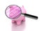 Piggy Bank with Dollar Sign with Magnifying Glass