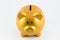 Piggy bank in gold color