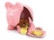 Piggy bank with golden coins