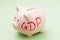 Piggy bank with the inscription, close-up. GDP growth concept