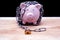 Piggy bank locked, chained with black background, Protect savings, Protect capital, Protect retirement fund concept