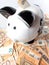 Piggy bank and many fifty euro banknotes savings investment concept