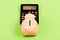 Piggy bank pig and calculator. Taxes and charges may vary. Helping make smart financial choices. Pay taxes. Taxes