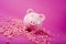 Piggy bank on pink background