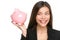 Piggy bank savings woman smiling happy