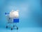 Piggy bank on a shopping mall cart On a blue background. Shopping concept