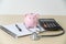 Piggy bank with stethoscope  financial checkup or saving for medical insurance costs