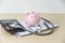 Piggy bank with stethoscope  financial checkup or saving for medical insurance costs