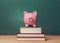 Piggy bank on top of books with chalkboard creating a cost of education theme