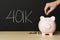 Piggybank 401k hand and coins