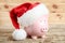 Piggybank with santa hat