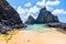 Pigs Bay beach (Baia dos Porcos) in Fernando de Noronha Island Brazil with Two Brothers Hill (Morro dois Irmaos)