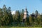 PihlajÐ°vesi, Finland, 15 August, 2014: People leave church after preaching in PetÃ¤jÃ¤vesi Old Church. Church is listed as UNESCO