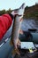 Pike fish caught by fisherman in boat, cool tone