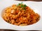 Pilaf with chicken, carrot and green peas