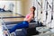 Pilates reformer woman short box flat exercise