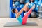 Pilates Teaser exercise woman on mat gym indoor