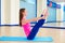 Pilates woman open leg rocker exercise workout