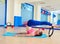 Pilates woman roll over magic ring exercise