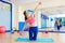 Pilates woman sand balls exercise workout at gym