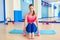 Pilates woman sand balls exercise workout at gym