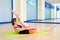 Pilates woman scissors exercise workout at gym