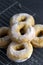 Pile of 5 Doughnuts on a dark background