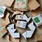 A pile of assorted paper and cardboard materials m