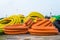 Pile of big industrial plastic corrugated pipes on ground