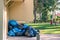 Pile blue and black garbage bags on the street, in the city