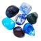 Pile of blue natural mineral gemstones isolated