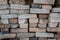 A pile of bricks. Warehouse building materials. Fragment of bricks used as building materials