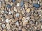 pile of brownish pebble stone texture background