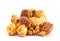 Pile of Caramel Pecan Popcorn on a White Background