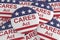 Pile of CARES Act Buttons With US Flag, 3d illustration