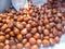 Pile of chestnuts roasted for sale in a market