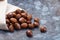 Pile of chestnuts on stone texture floor