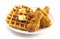 Pile of Chicken and Waffles Isolated on a White Background