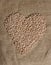 Pile of Chickpeas in Shape of Heart on Burlap Bag