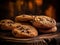 Pile of chocolate chip cookies on top of wooden table. There are several cookies in stack, with some being closer to