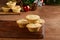 Pile of christmas mince pies with fruit tarts in background