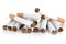 Pile of cigarettes on white background with selective focus
