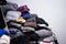 A pile of clothes placed high in a fashionable woman`s room