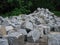 A pile of cobblestones in the park.