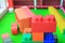 Pile of colorful big blocks building toys foam. Education preschool indoor playground