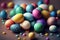 a pile of colorful easter eggs on a table