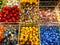 A pile of colorful glass marbles with different patterns