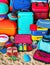 pile of colorful luggage in the beach illustration